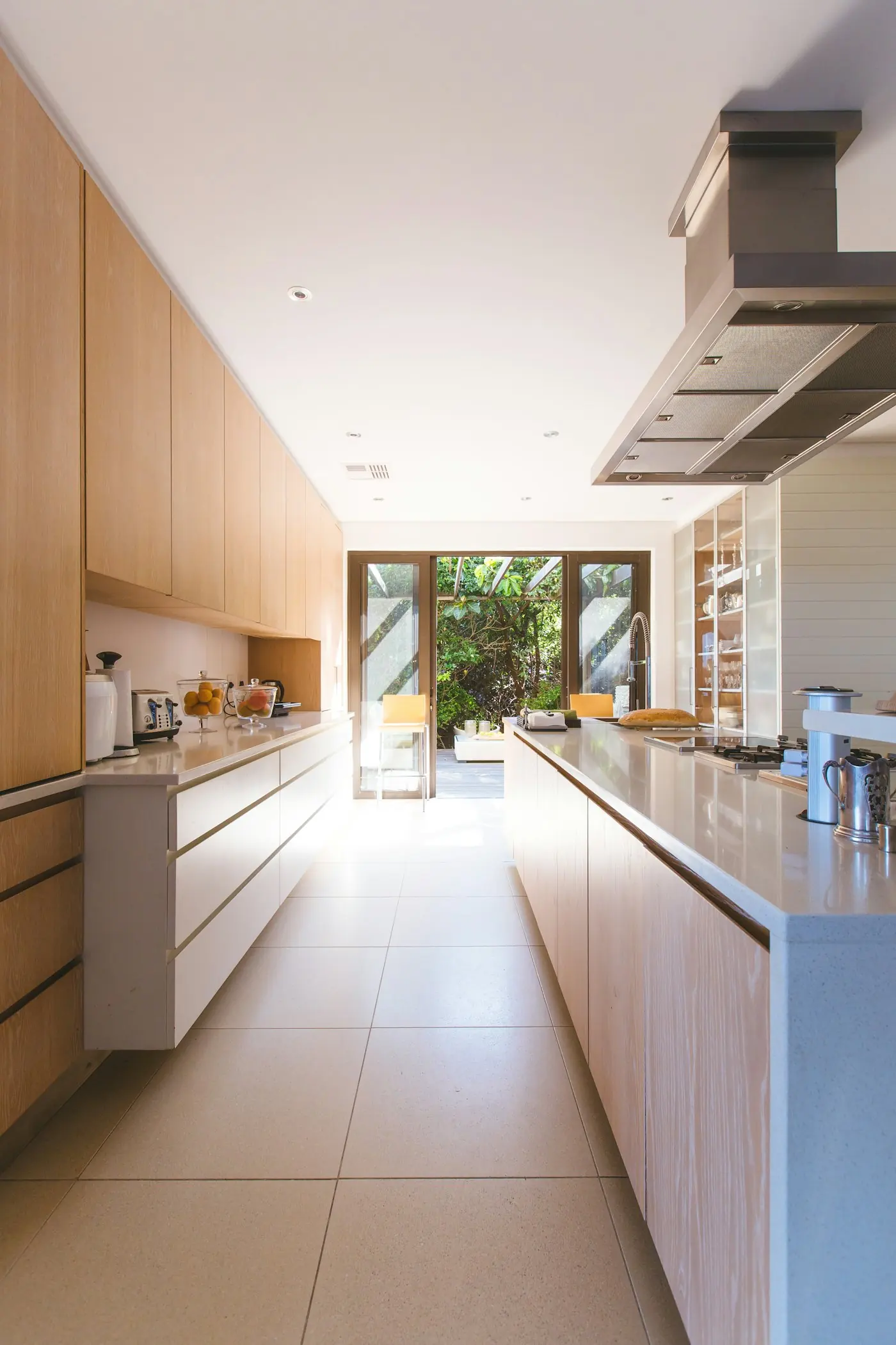 A finished kitchen extension with bi-fold doors opening onto the garden